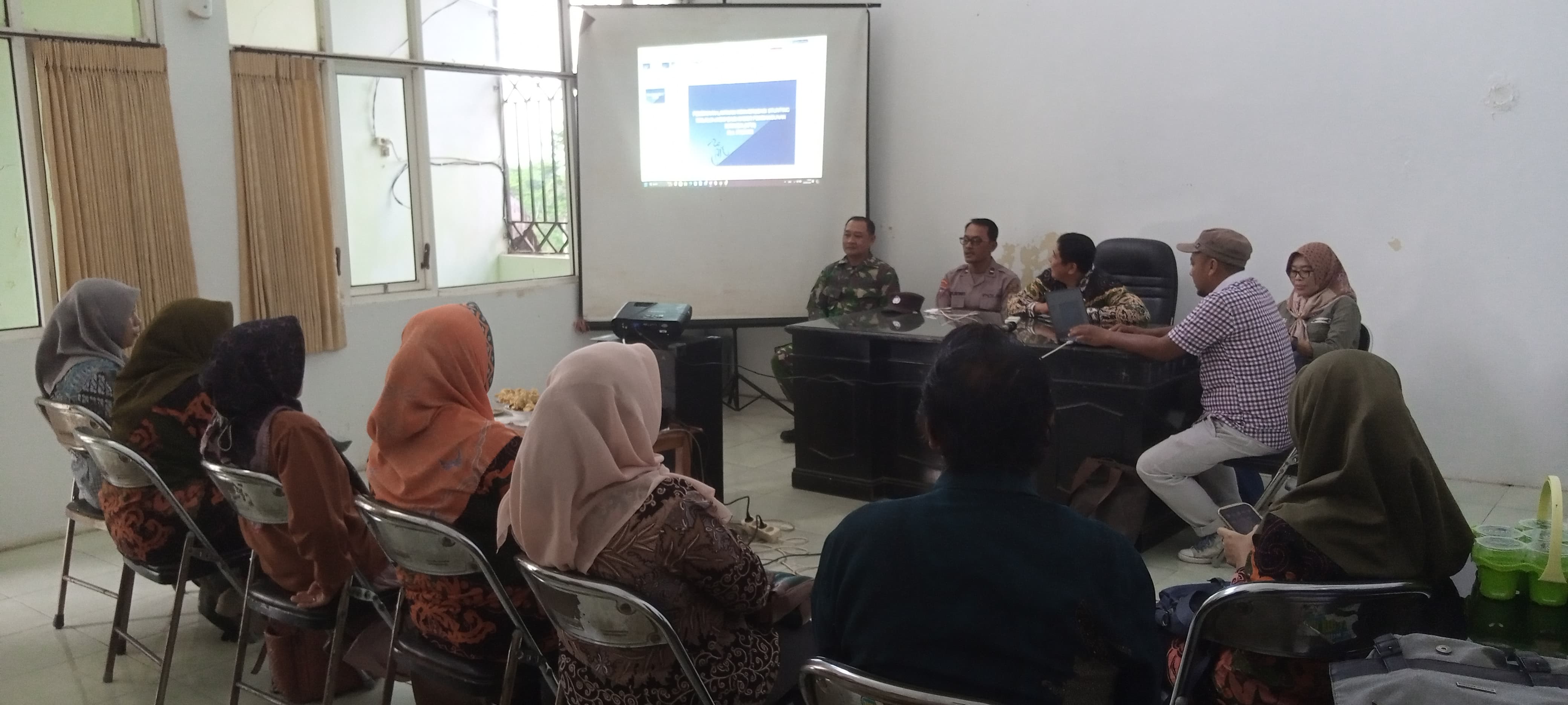 PEMBINAAN LAYANAN KONVERGENSI STUNTING MELALUI eHDW BAGI KADER PEMBANGUNAN MANUSIA KECAMATAN PADANG